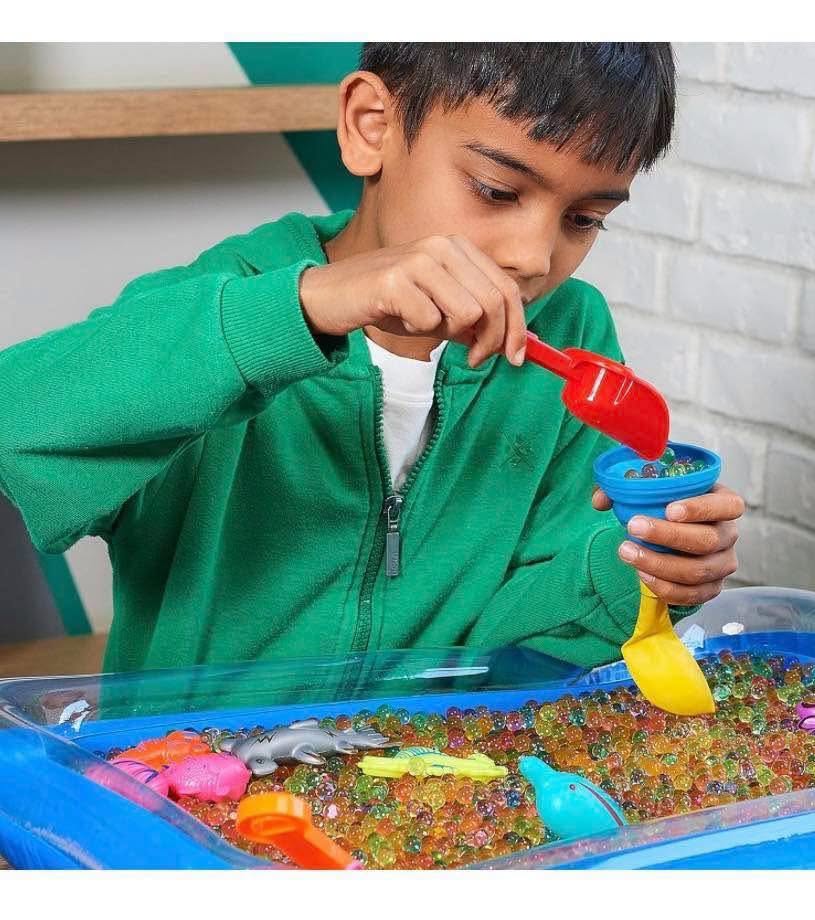 Juego sensorial de perlas de agua con accesorios